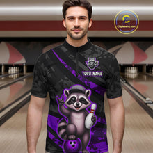 Load image into Gallery viewer, Man wearing a black and purple bowling shirt with a raccoon design in a bowling alley.