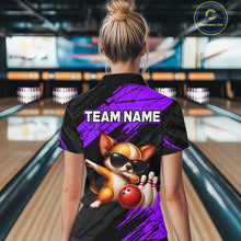 Load image into Gallery viewer, Person wearing a bowling shirt with a dog graphic and 'TEAM NAME' text in a bowling alley.