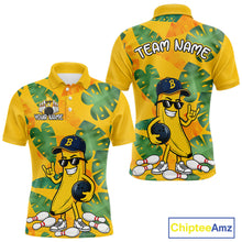 Load image into Gallery viewer, Front and back views of a bright yellow polo shirt with tropical leaf patterns, featuring a cartoon banana character wearing sunglasses and holding a bowling ball among scattered pins.