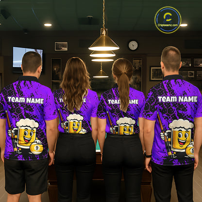 Four people wearing a bright purple billiards polo with black splatter graphics, custom “TEAM NAME” text, and a smiling beer mug mascot holding a pool cue.