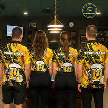 Load image into Gallery viewer, Four people wearing a bright yellow billiards polo with black splatter graphics, custom “TEAM NAME” text, and a smiling beer mug mascot holding a pool cue.
