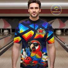 Load image into Gallery viewer, A man wearing a short-sleeve bowling jersey with a colorful geometric pattern and a cartoon parrot graphic, standing in front of a blurred bowling alley background. The jersey has a black collar and a black front zipper, with a 'YOURNAME' placeholder on the chest.