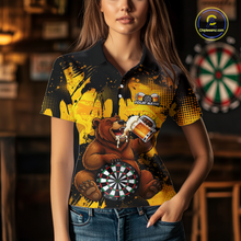 Load image into Gallery viewer, Person wearing a black and yellow darts polo featuring a bear drinking beer, dartboard graphics, and custom team and player name text.