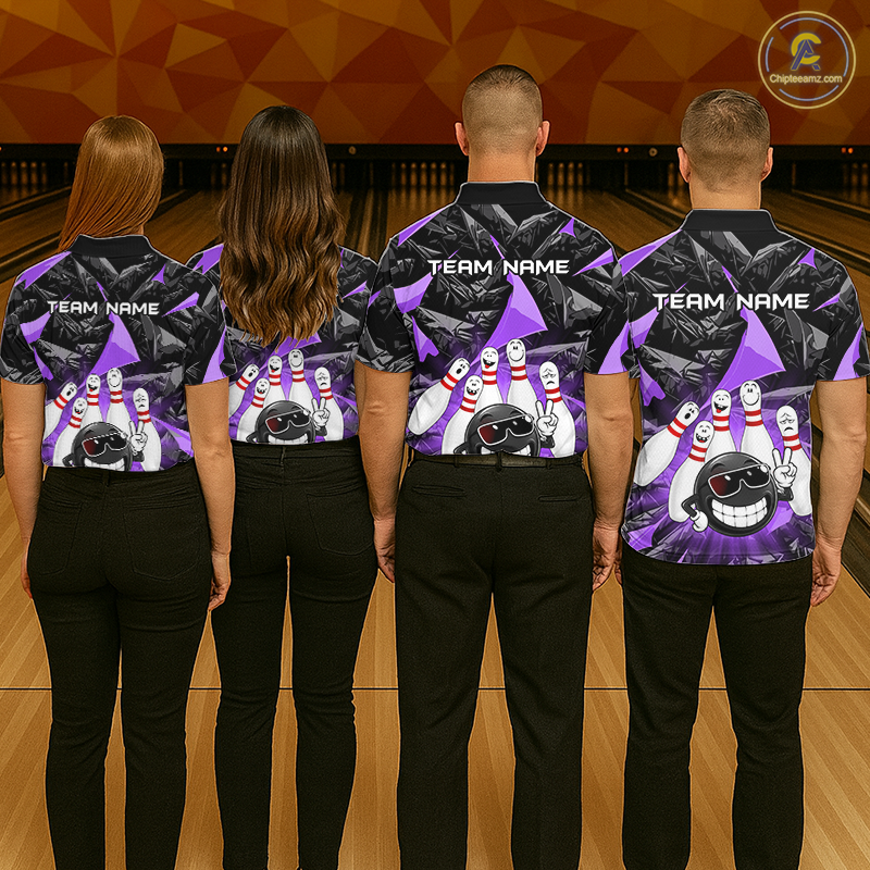 Four people standing with their backs to the camera in a bowling alley, wearing matching purple and black bowling shirts with bowling pin and cartoon character graphics, paired with black pants.