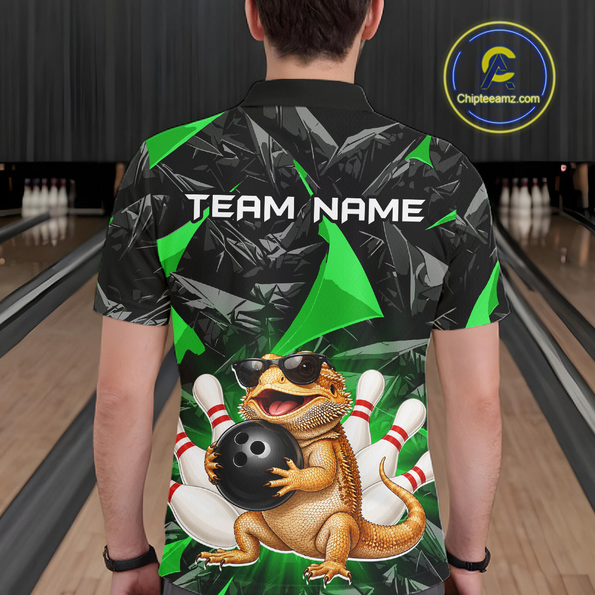 Men’s green bearded dragon bowling polo shirt, back view on male model in bowling lane 