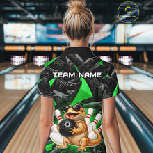 Load image into Gallery viewer, Women’s green bearded dragon bowling quarter zip shirt, back view on female model in bowling lane 