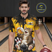 Load image into Gallery viewer, Man wearing a black and yellow bowling-themed shirt with a cat design in a bowling alley.