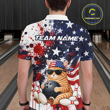 Load image into Gallery viewer, Person wearing a colorful shirt with a cat holding a bowling ball design on a bowling alley.