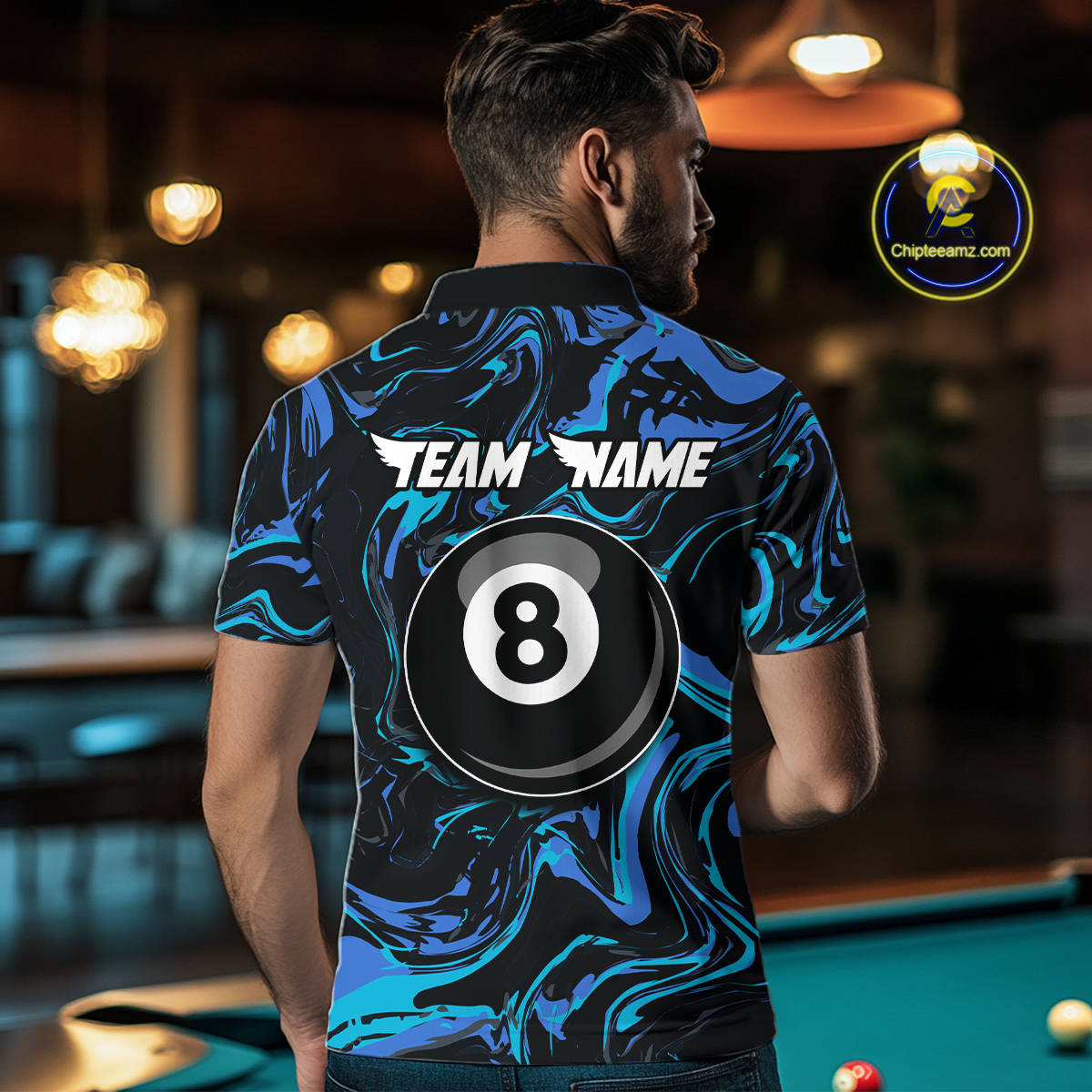 Back view of a woman wearing a black billiards polo with teal and turquoise marble swirls, “TEAM NAME” text, and a large 8-ball graphic.
