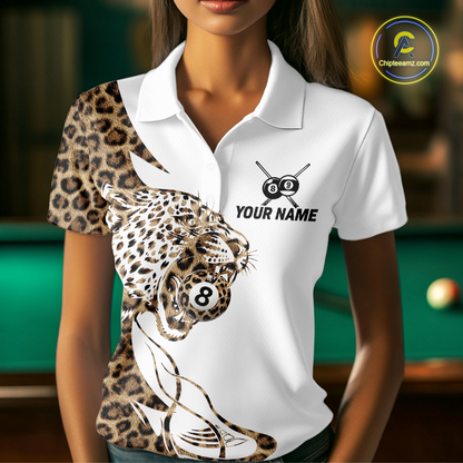 Woman wearing a white polo shirt with leopard 8 ball print design on a billiards table.