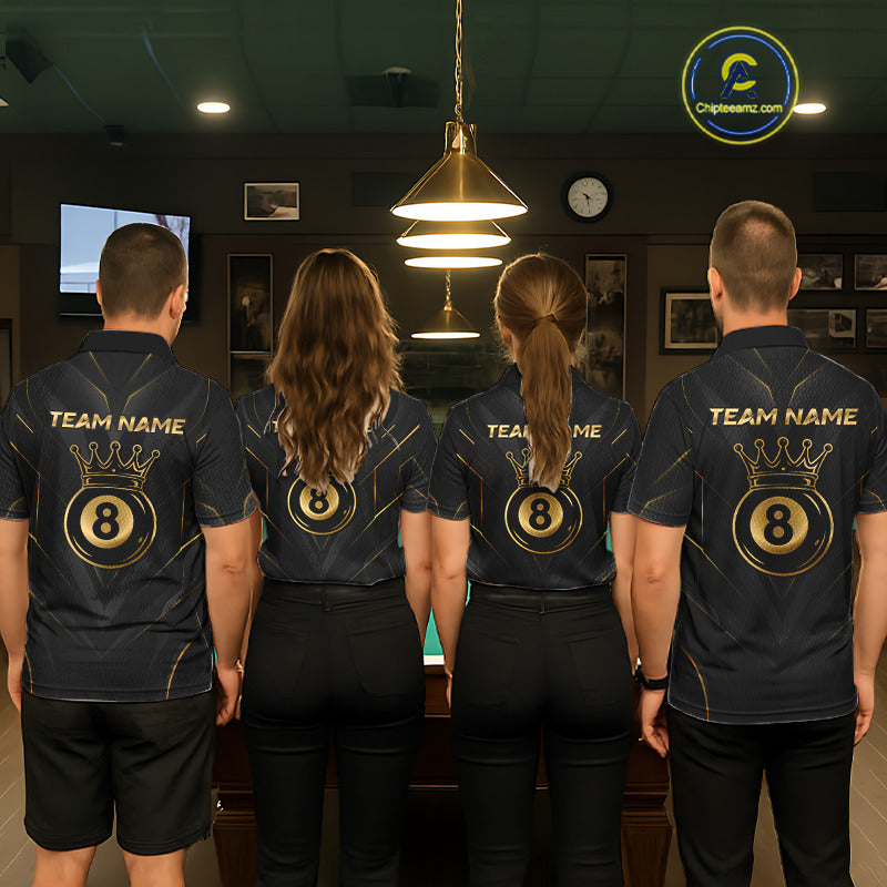 Four people wearing matching black shirts with 'Team Name' and number 8 design in a room.