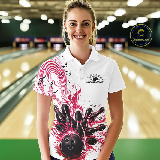 Female model wearing a white and pink bowling polo shirt at the bowling lane with musical bowling motifs and wave accents.
