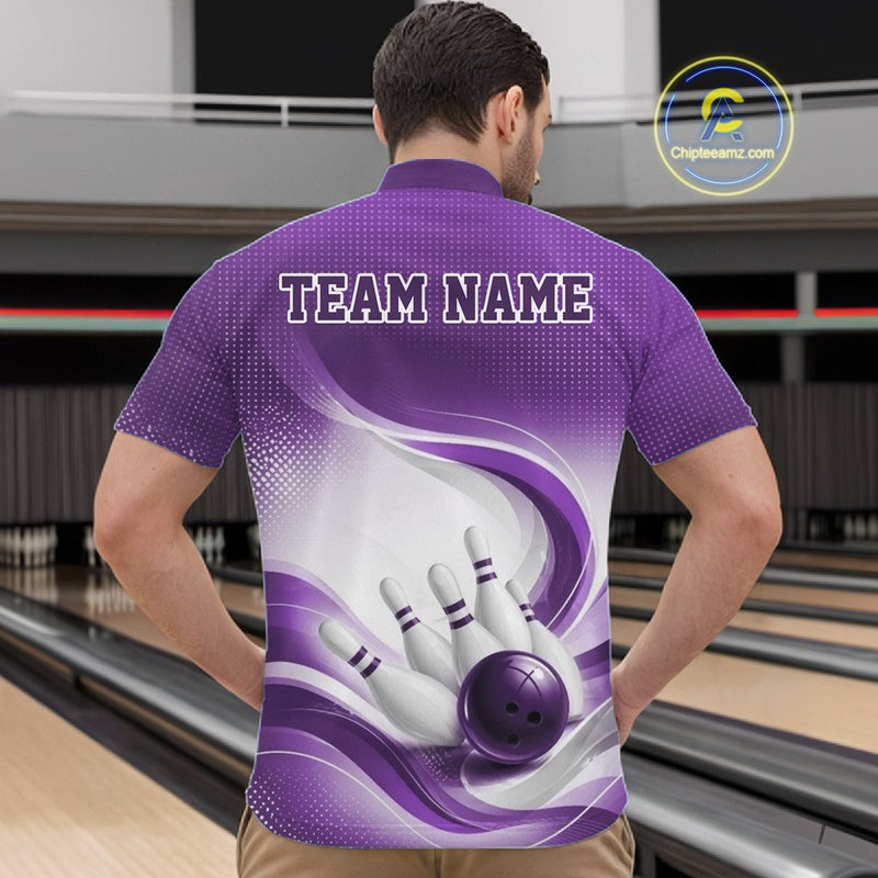 Front view of a male model wearing a white and purple bowling quarter-zip shirt with sweeping wave artwork and a bowling ball striking pins inside a bowling center
