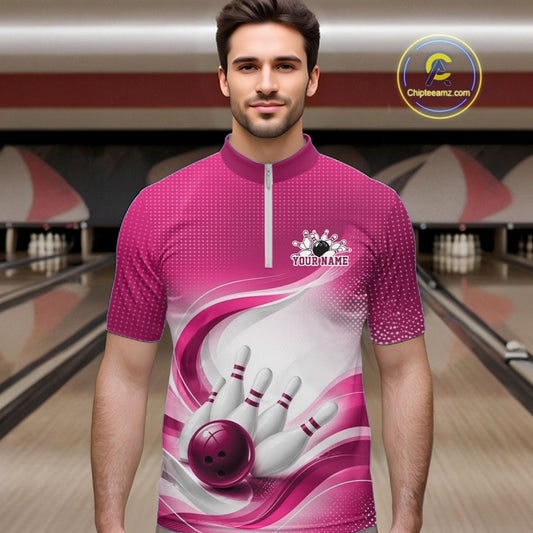 Male model wearing a white and pink bowling quarter-zip shirt with curved wave artwork and a bowling ball crashing into pins
