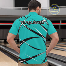 Load image into Gallery viewer, Front view of a male bowler wearing a turquoise blue, black, and white bowling quarter zip shirt in a bowling lane