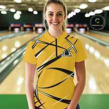 Load image into Gallery viewer, Front view of a female bowler wearing a yellow, black, and white bowling quarter zip shirt in a bowling lane