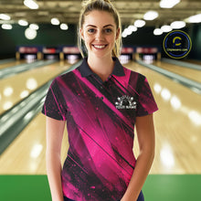 Load image into Gallery viewer, Woman wearing a pink and black bowling shirt with a logo in a bowling alley.