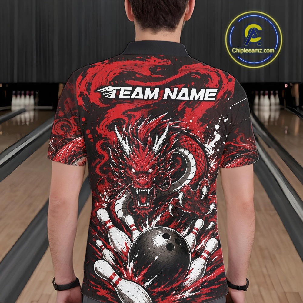 Person wearing a red and black dragon-themed bowling shirt with 'TEAM NAME' text in a bowling alley.