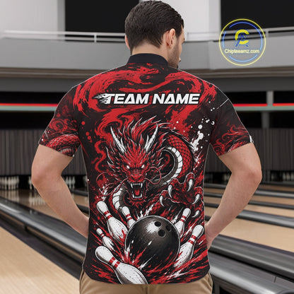 Person wearing a red and black dragon-themed bowling shirt with 'TEAM NAME' text at a bowling alley.