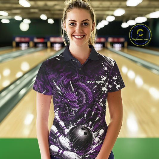Woman wearing a purple dragon-themed bowling shirt in a bowling alley.