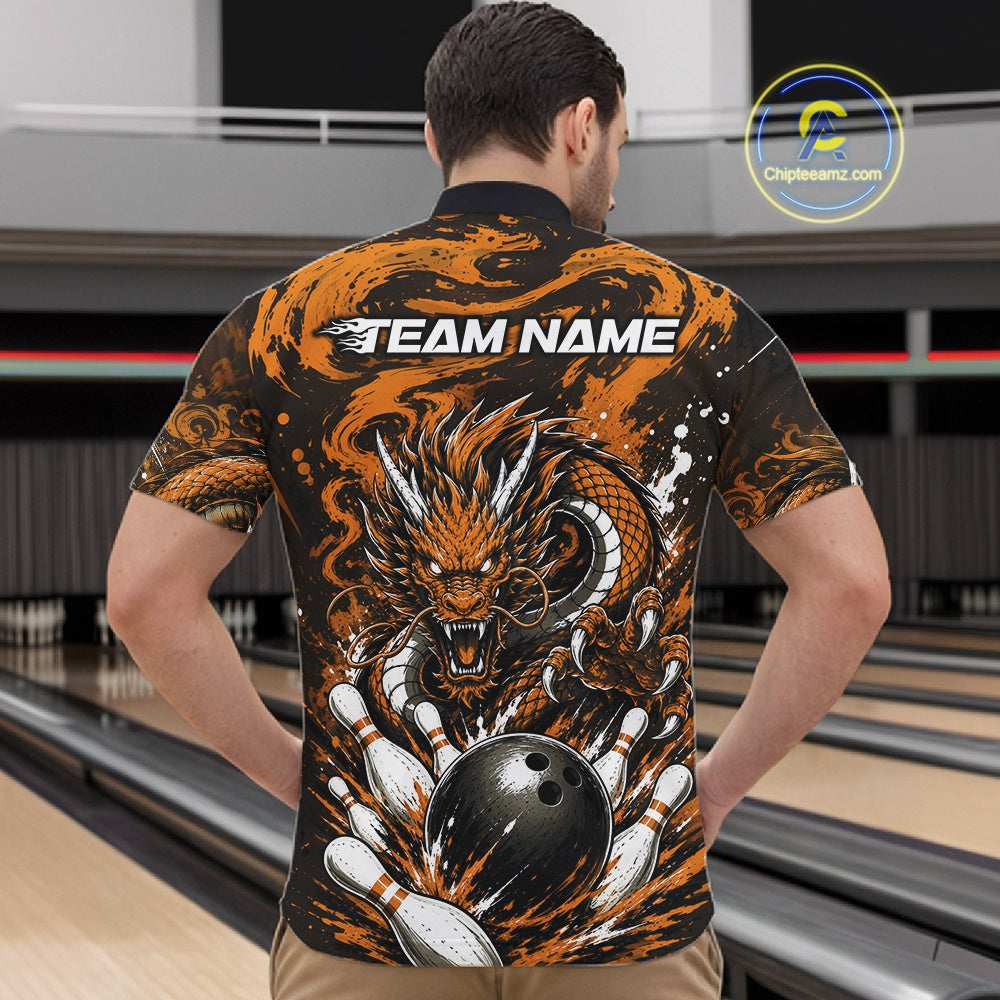 Person wearing a bowling shirt with a dragon design and 'Team Name' text at a bowling alley.