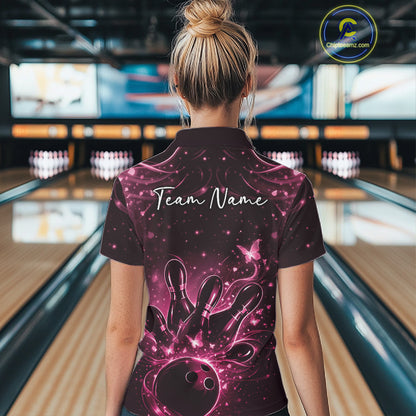 Back view of a female model wearing a black and pink bowling polo shirt with glowing butterfly accents.