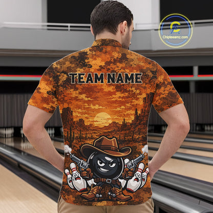 A man viewed from behind wearing a short-sleeve quarter-zip shirt with a bowling-themed western graphic. The shirt features a desert sunset scene with the text 'TEAM NAME' across the upper back and a cartoon bowling ball character wearing a cowboy hat and holding two bowling pins.