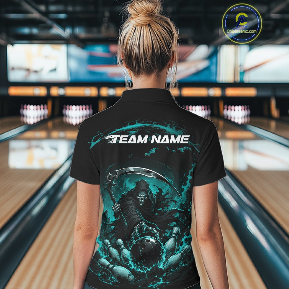 Back view of a female model wearing a black and cyan blue bowling quarter zip shirt showcasing a grim reaper with a blazing bowling ball striking scattered pins amid swirling flames in a bowling lane.