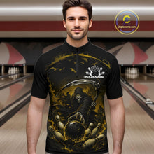 Load image into Gallery viewer, Front view of a male model wearing a black and yellow bowling quarter zip shirt featuring a grim reaper reaching through swirling flames to command a blazing bowling ball striking scattered pins in a bowling lane.