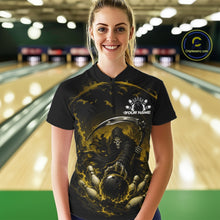 Load image into Gallery viewer, Front view of a female model wearing a black and yellow bowling quarter zip shirt showcasing a grim reaper with a blazing bowling ball striking scattered pins amid swirling flames in a bowling lane.