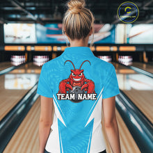 Load image into Gallery viewer, Back view of a female model in a bowling alley wearing a blue custom bowling polo shirt with a funny aggressive crawfish holding a bowling ball in a sportswear-style design.