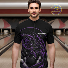 Load image into Gallery viewer, Front view of a male model in a bowling alley wearing a purple custom quarter-zip bowling shirt featuring an aggressive dragon with flames in a dynamic and energetic design.