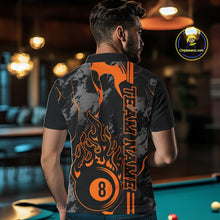 Load image into Gallery viewer, Back view of a male model wearing a polo shirt with billiard 8 ball flame graphics on a blue and green abstract background.
