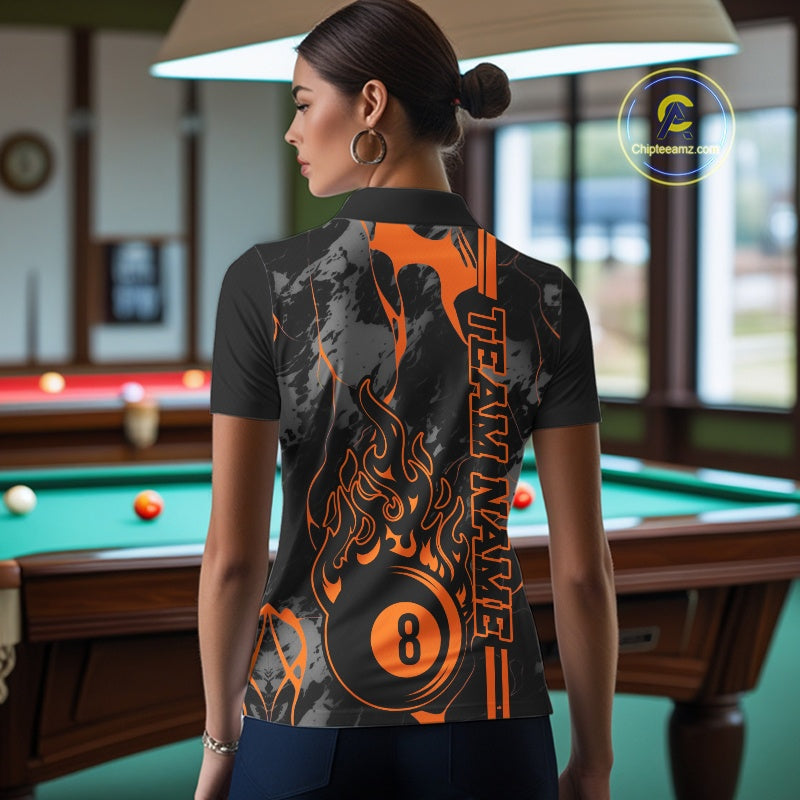 Back view of a female model wearing a polo shirt with billiard 8 ball flame artwork over a blue and green abstract background.