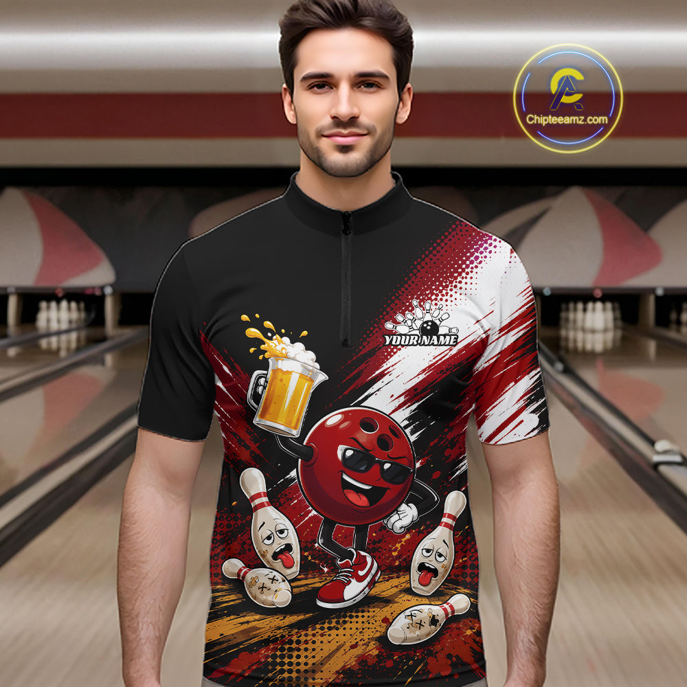 A man wearing a custom bowling-themed short-sleeve quarter-zip shirt with a red and black graphic design featuring a cartoon bowling ball, pins, and beer, set against a blurred bowling alley background.