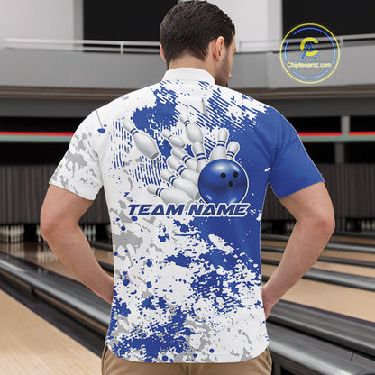 Male model at a bowling lane wearing blue and white quarter zip shirt, front view featuring blue and white splatter background with abstract athletic styling