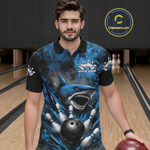 Load image into Gallery viewer, Man wearing a blue and black polo shirt with a shark design in a bowling alley.