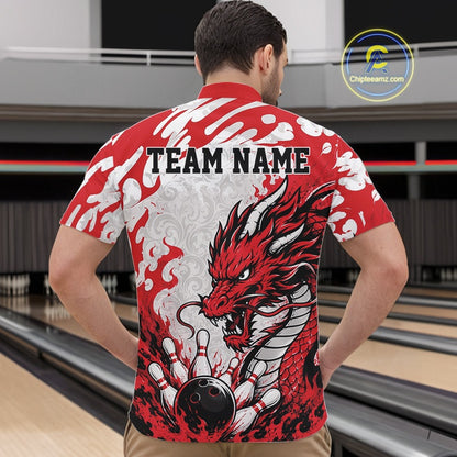 Person wearing a red and white bowling shirt with a dragon design and 'TEAM NAME' text, standing in a bowling alley.