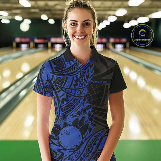Woman wearing a blue and black maori tribal pattern bowling shirt with a bowling alley in the background