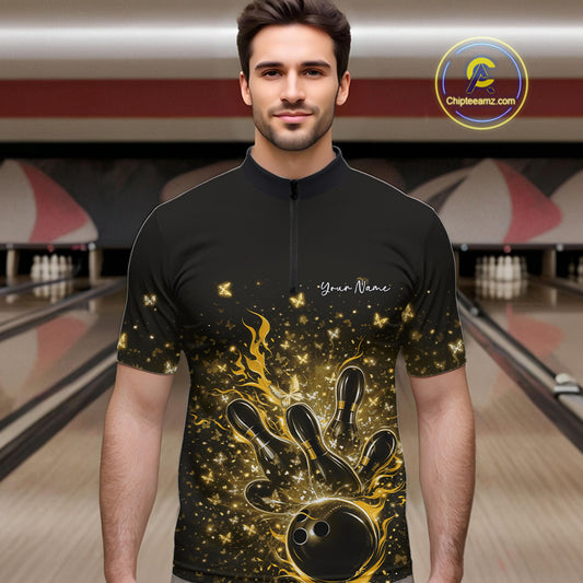 Male model wearing a black and yellow bowling quarter-zip shirt at the lane with fiery bowling strike graphics.
