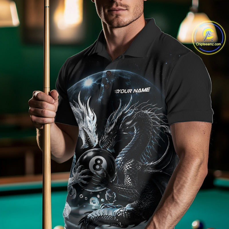 A man wearing a black polo shirt with a detailed graphic of a silver dragon wrapping around an 8-ball pool bill under a blue starry sky. He is holding a pool cue in a dimly lit pool hall, with a 'CitySewers.