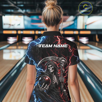 A woman viewed from behind wearing a black short-sleeve bowling shirt with a Grim Reaper graphic, lightning effects, and the text 'TEAM NAME' on the back, standing in a bowling alley.