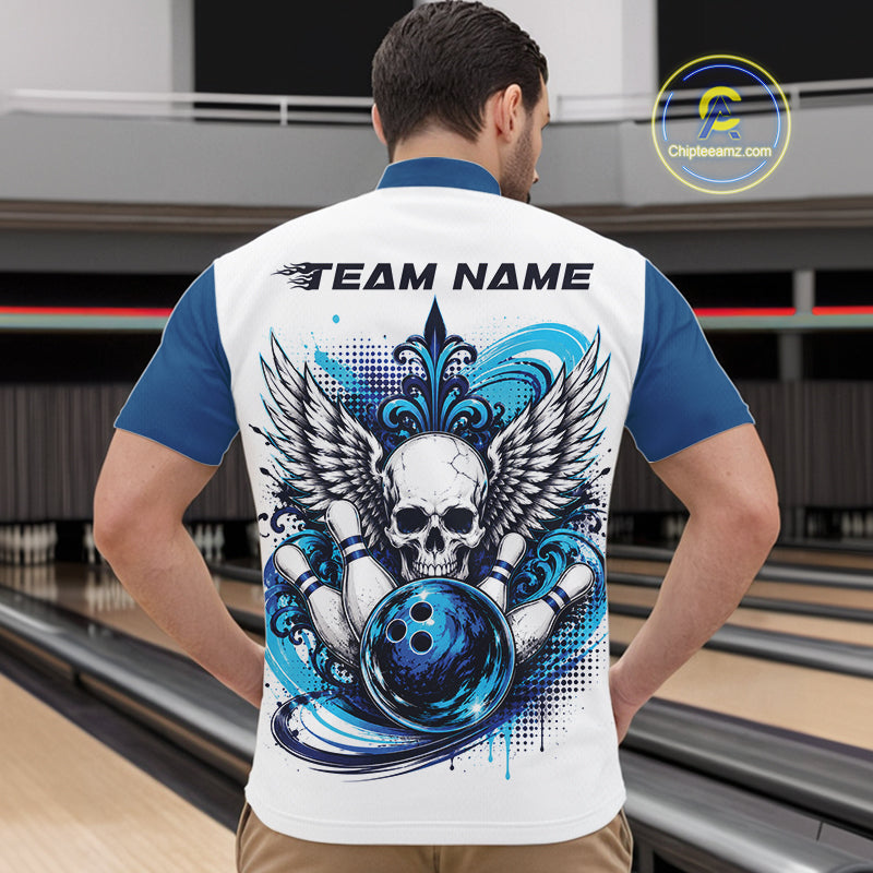 Back view of a man in a bowling alley wearing a bowling shirt with quarter zip collar, blue skull-themed bowling graphic with black wings, pins, bowling ball shirt with “Team Name” across the shoulders.