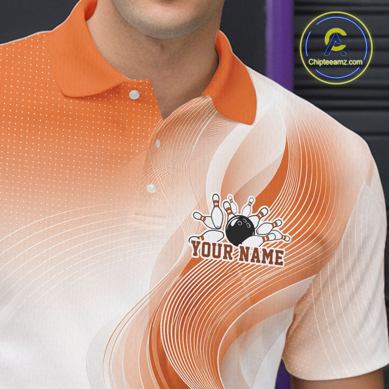 Detailed left chest view of a white and orange bowling polo shirt with abstract line motifs and a bowling ball hitting the pins