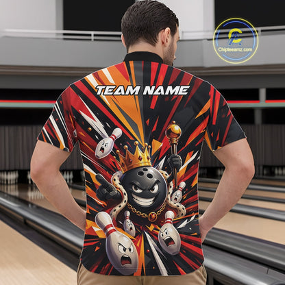 Front view of a male model wearing a black, red, and orange bowling quarter zip shirt featuring a crowned cartoon bowling ball holding a royal scepter with animated bowling pins and colorful burst graphics in a bowling lane.