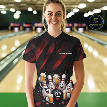 Load image into Gallery viewer, Female model shown from the front wearing a black and red bowling quarter zip shirt featuring festive cartoon bowling balls and pins raising frothy beer mugs with confetti and bold diagonal stripes in a bowling lane.