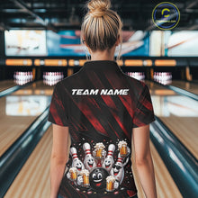 Load image into Gallery viewer, Back view of a female model wearing a black and red bowling quarter zip shirt featuring funny cartoon bowling balls and pins raising frothy beer mugs with confetti and bold diagonal stripes in a bowling lane.