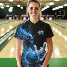 Load image into Gallery viewer, Front view of a female model in a bowling alley wearing a black quarter zip bowling shirt with a blue flaming skull, lightning, bowling pins, and a custom name.
