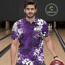 Load image into Gallery viewer, Front view of a male model in a bowling alley wearing a purple bowling polo shirt featuring a white paint splatter sportswear design.
