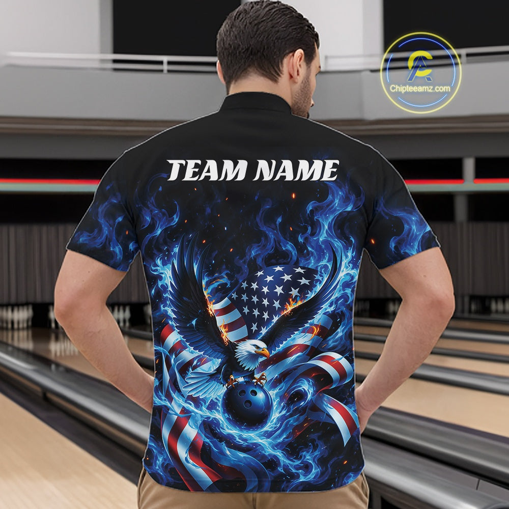 Male model front view at the bowling lane wearing a bowling quarter zip shirt with flaming bald eagle artwork, blue bowling ball, and flag accents.